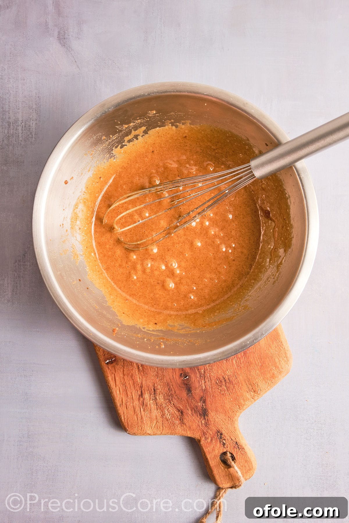 Decadent Brown Butter Pecan Delights 11 Wet ingredients for cookies perfectly mixed and ready for the incorporation of dry ingredients.