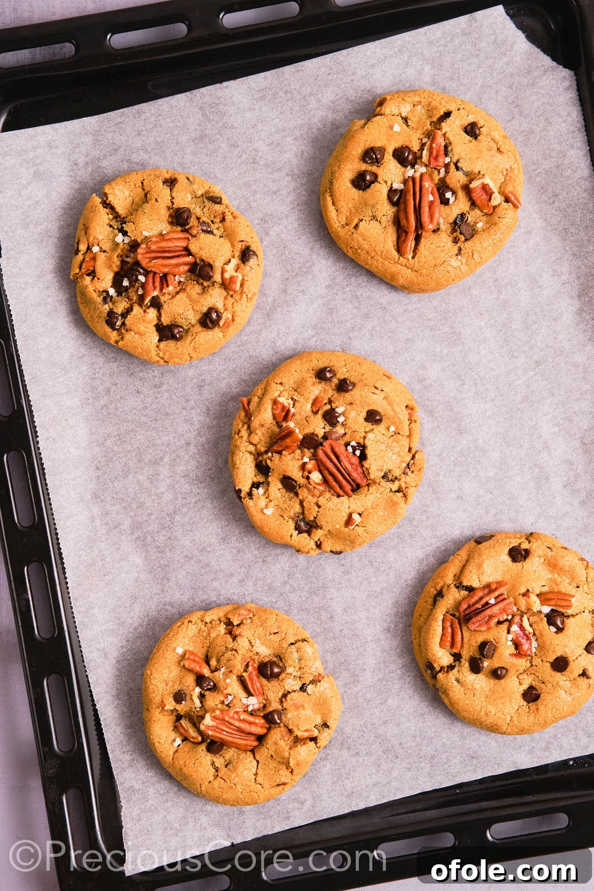 Decadent Brown Butter Pecan Delights 15 Perfectly baked brown butter pecan cookies on a baking sheet, golden and irresistibly inviting.