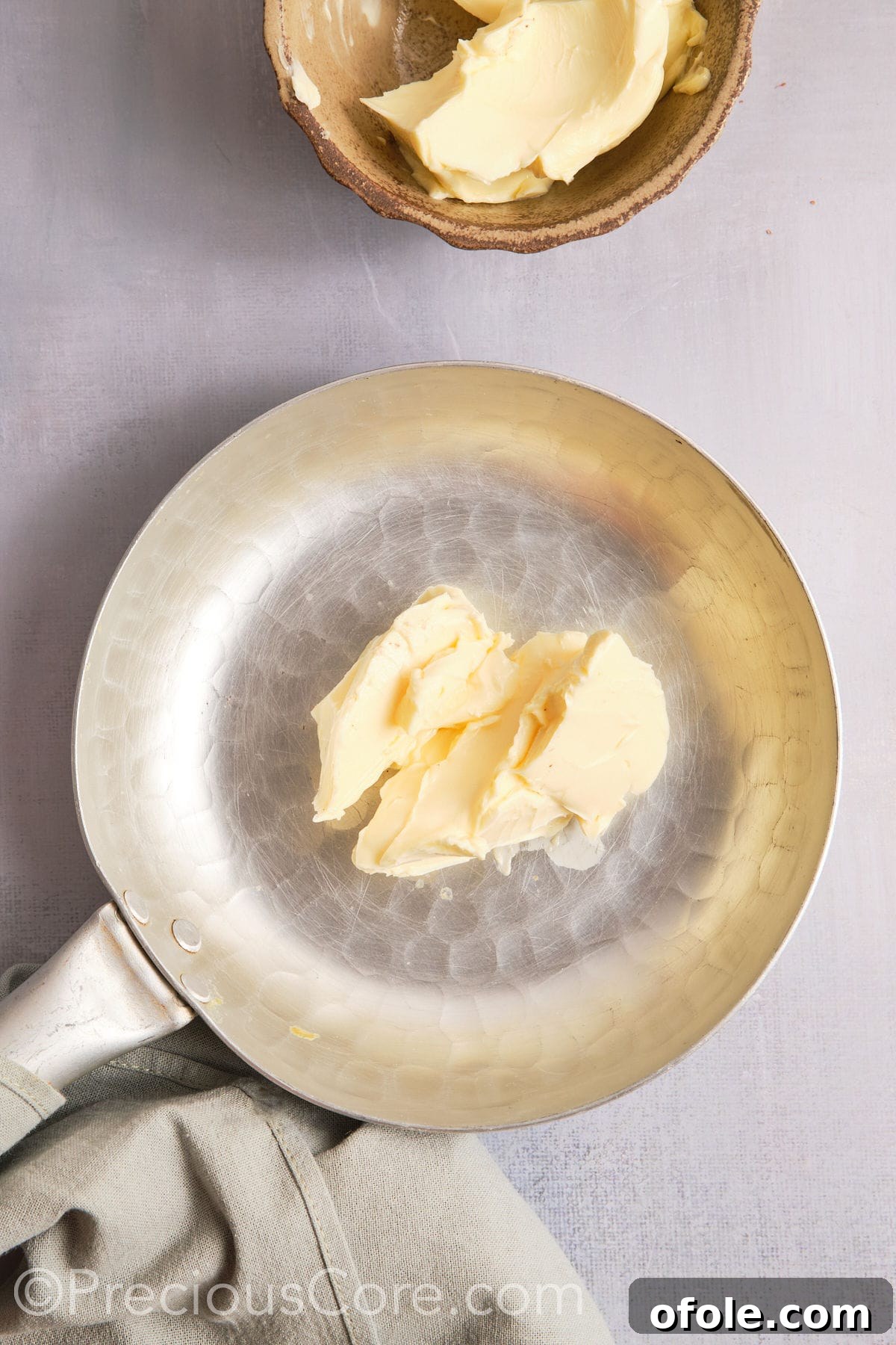 Decadent Brown Butter Pecan Delights 6 Butter melting in a pan, beginning the delicate browning process.