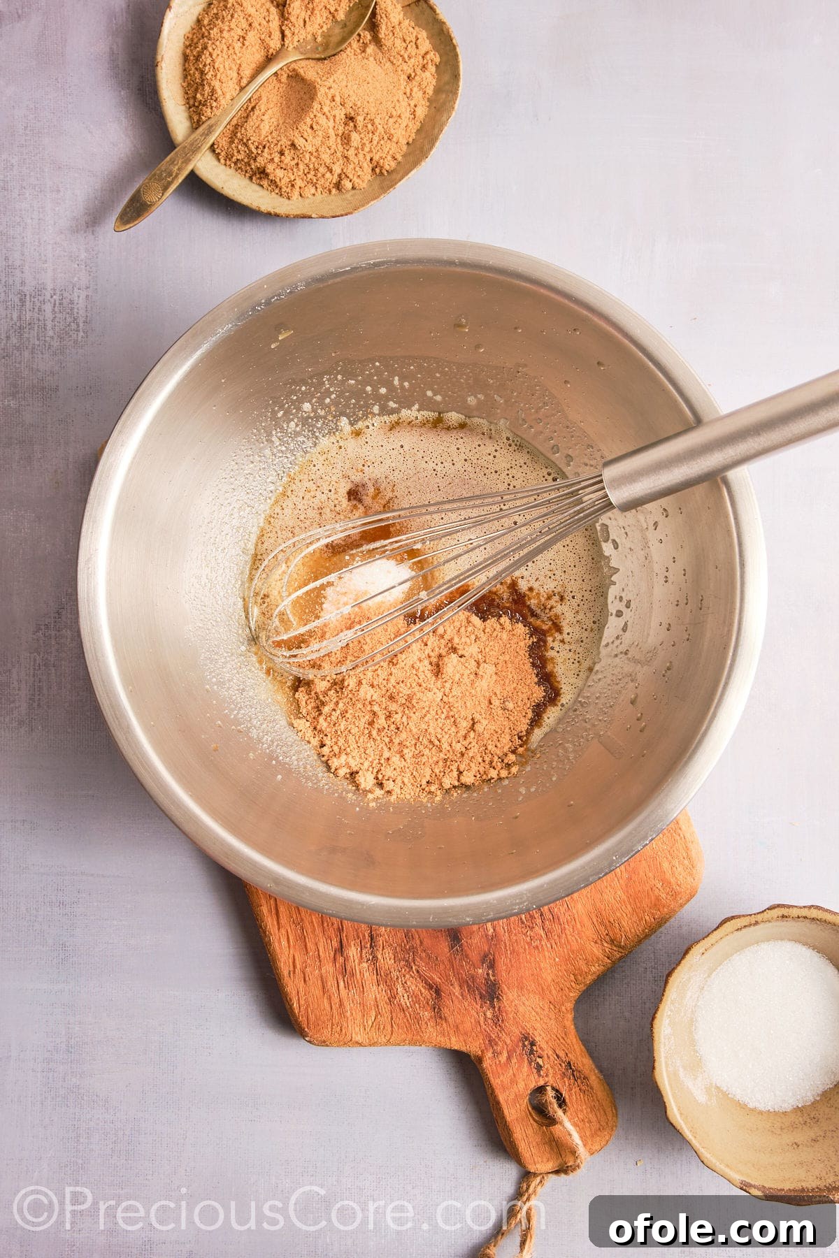 Decadent Brown Butter Pecan Delights 9 Adding brown sugar to the cooled brown butter mixture, ready for the next stage of whisking.