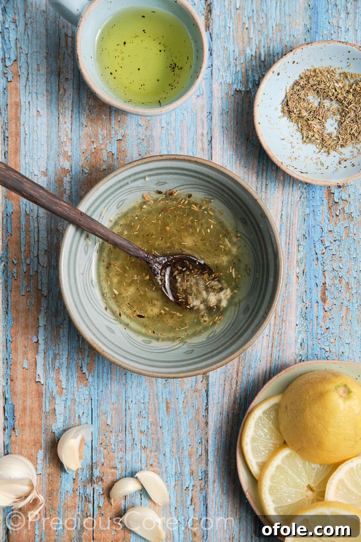 Vibrant Mediterranean Baked Fish 4 marinade for the baked Mediterranean fish in a small bowl.