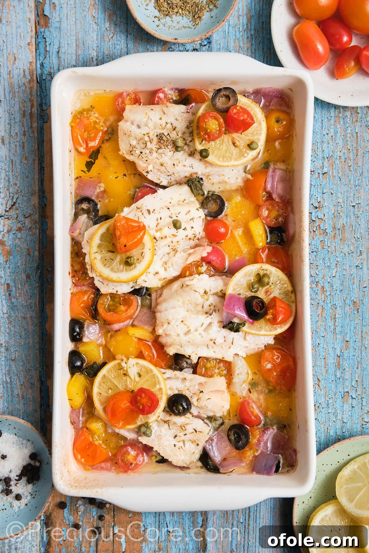 Vibrant Mediterranean Baked Fish 9 Baked Mediterranean fish and veggies in a pan.