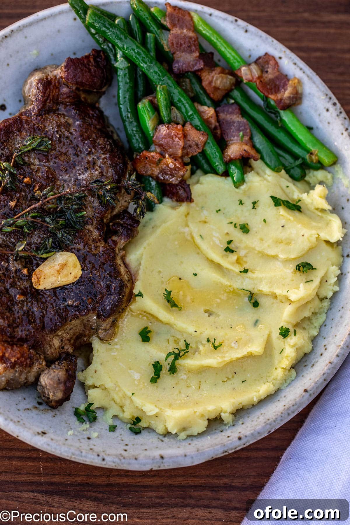 Velvety White Sweet Potato Puree 14 Bowl of steak, bacon green beans, and mashed white sweet potatoes.