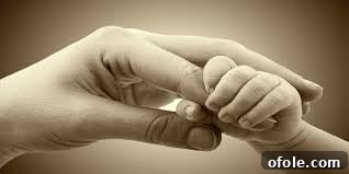 A Glimpse of the Impossible 2 A mother's hands holding a child's hand, symbolizing care and connection.