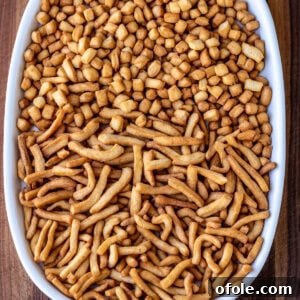 Chin chin on a white tray, showcasing its appealing golden color.