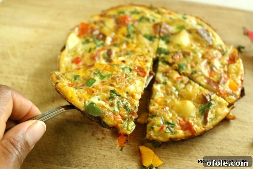Hearty Breakfast Frittata 2 Delicious homemade vegetable frittata served on a plate for breakfast