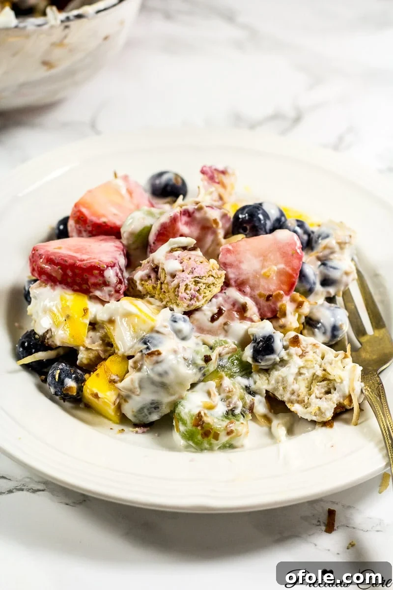 Rainbow Fruit Delight 13 A close-up of the delicious 7-layer fruit salad, showcasing its layered beauty and enticing textures, ready to be enjoyed.