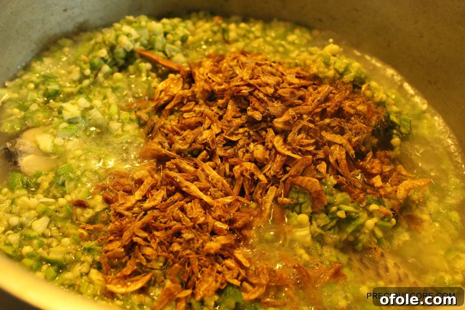 Effortless Okra Delight 7 Chopped Okra, Ground Crayfish, and Maggi Cubes Added to Fish Broth