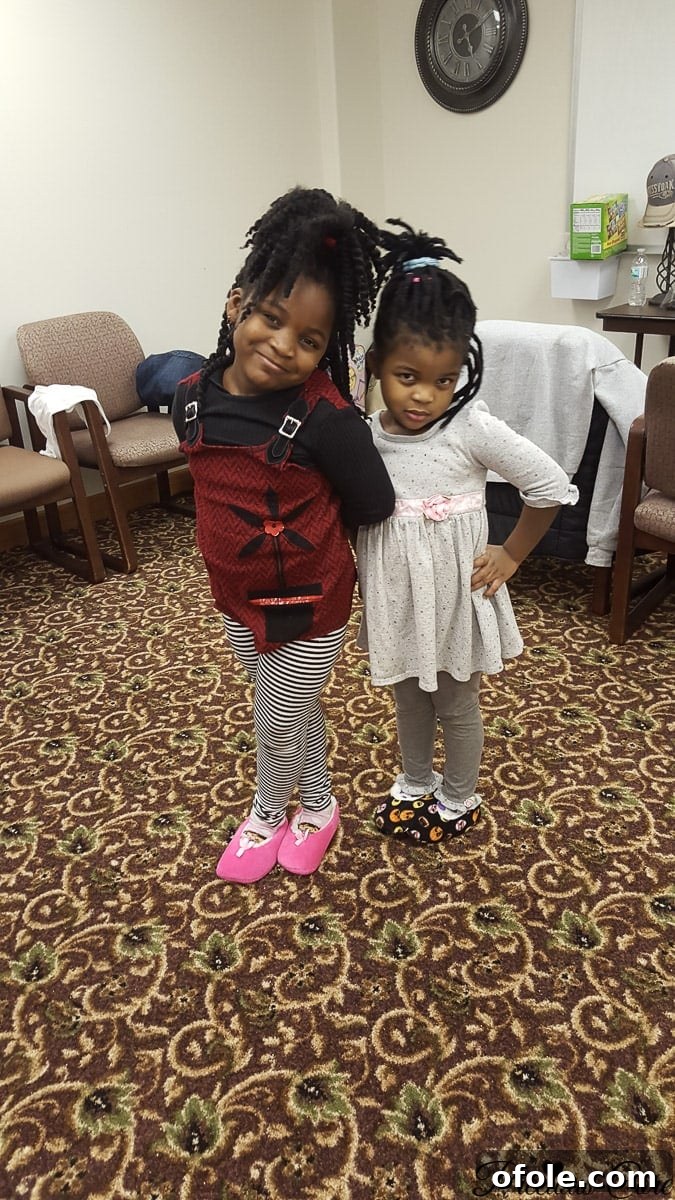 The First Chapter Of Our Homeschool Story 4 Two cheerful girls posing for a picture during their homeschooling year, showcasing their vibrant personalities