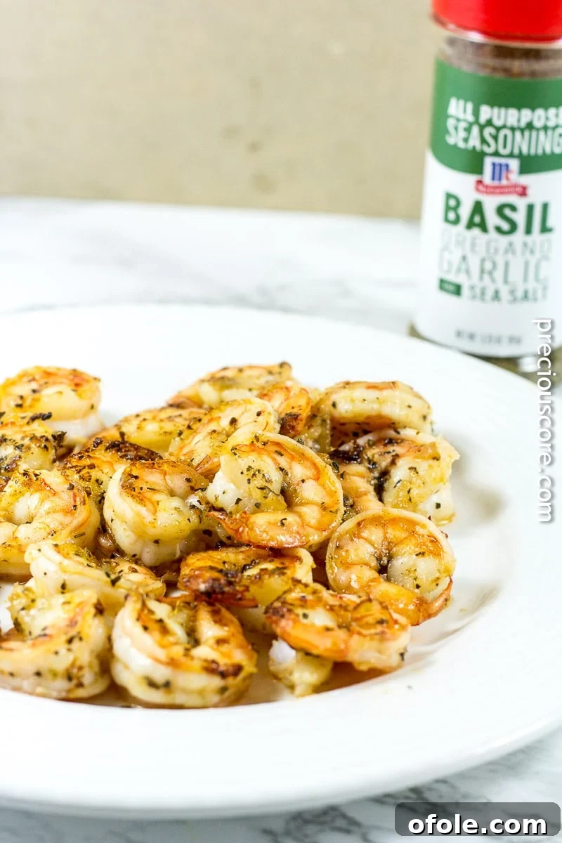 Cooked blackened shrimp in a skillet, ready for the pasta