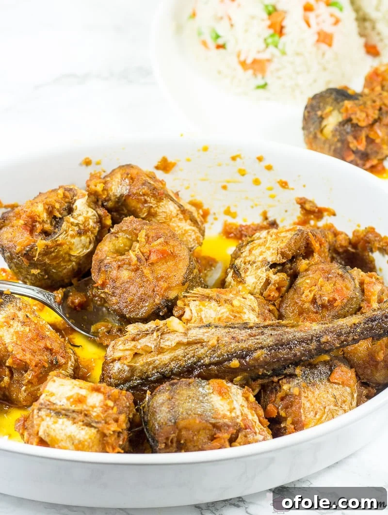 Sweet Chili Glazed Fish 2 How to make Nigerian peppered fish, showing fried fish pieces.