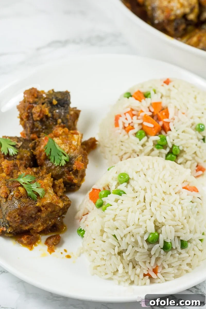 Sweet Chili Glazed Fish 6 Nigerian Peppered Fish - Fish in Tomato Sauce served with sides.