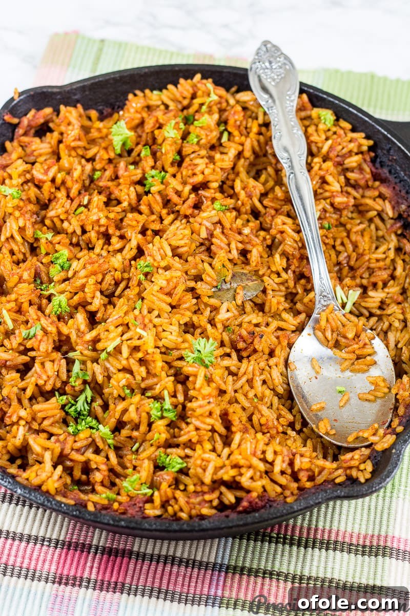 Easy Oven Baked Jollof Rice 2 Jollof Rice made in the oven, served in a cast iron skillet