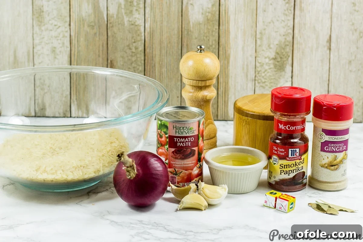 Easy Oven Baked Jollof Rice 3 Ingredients laid out for oven-baked Jollof rice