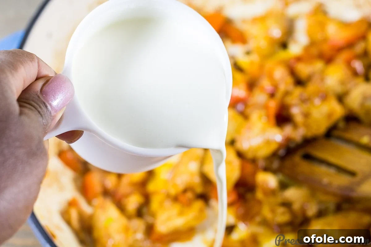 Velvety One Pot Chicken Macaroni 8 Macaroni and Chicken dinner recipe step 4 - Adding cream and reserved pasta water