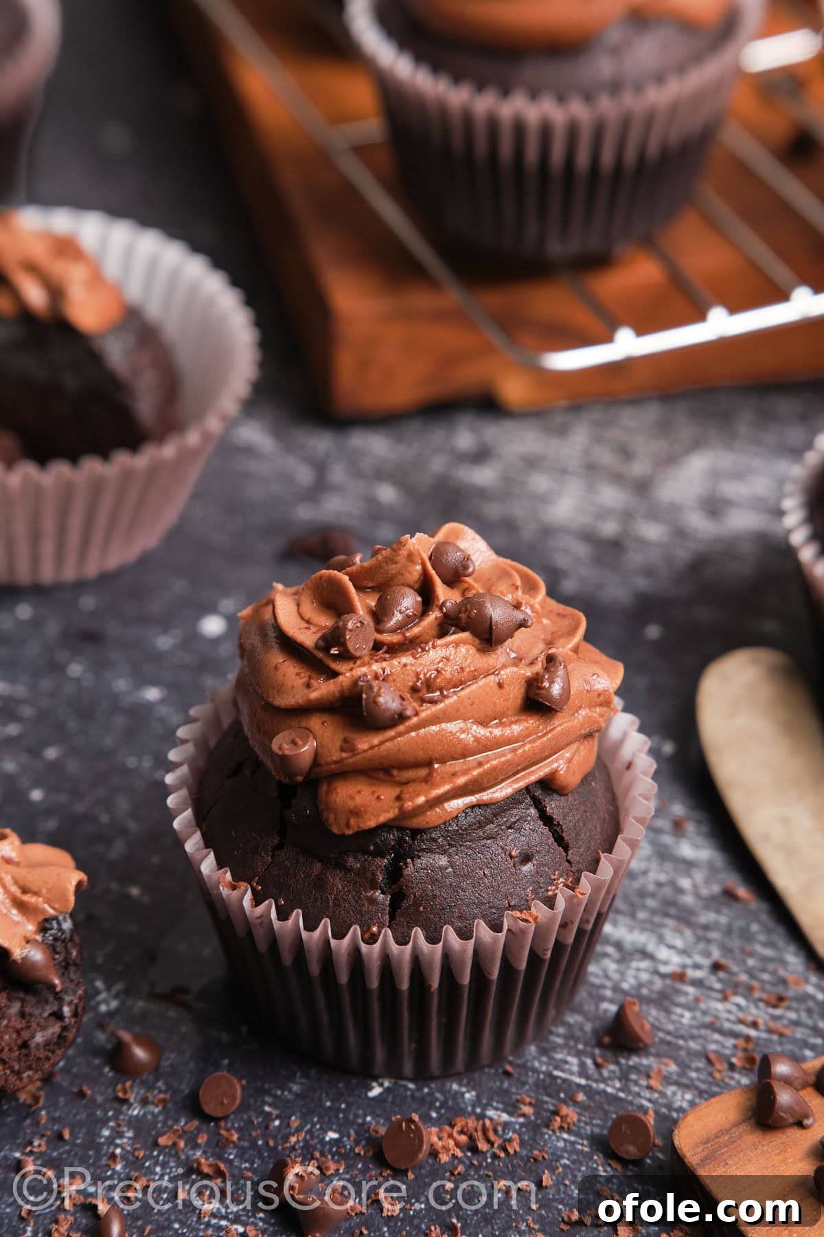 Decadent Double Chocolate Cupcakes 4 Ingredients and utensils laid out for baking easy chocolate cupcakes, showing the preparation stage.