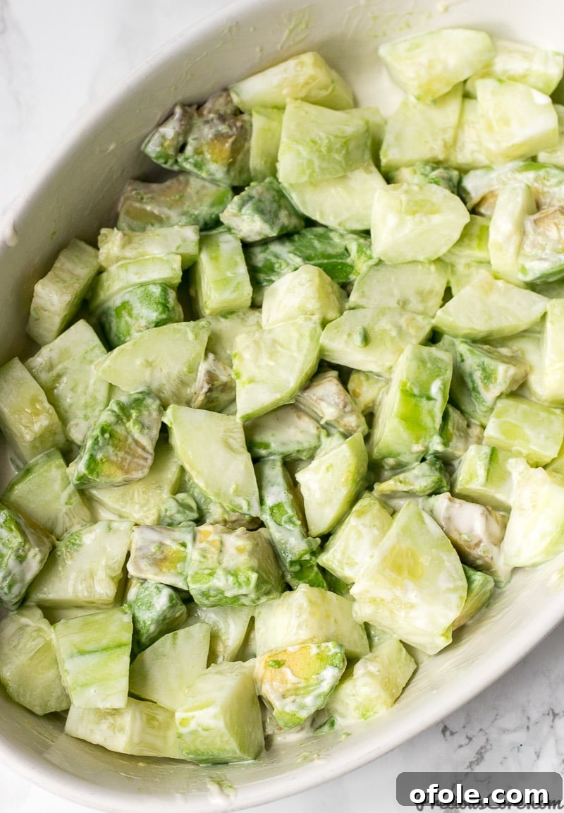Refreshing Avocado Cucumber Salad 5 Cucumber Avocado Salad tossed with dressing