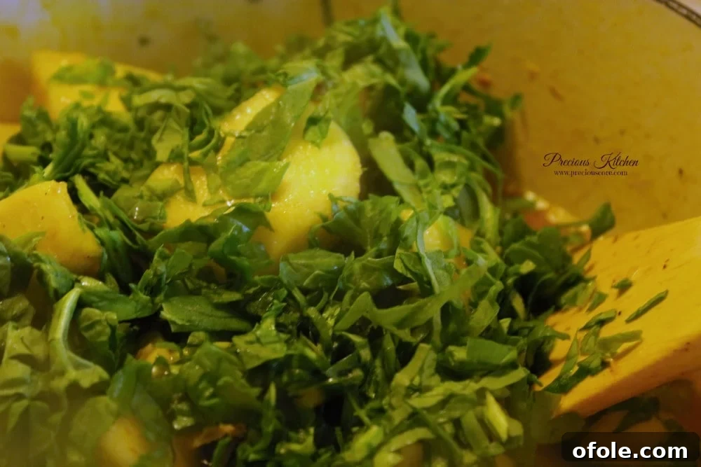 Green leafy vegetables added to yam porridge