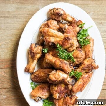 Super crispy epic oven-grilled chicken wings, golden and perfectly seasoned.