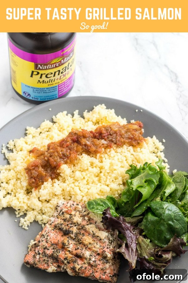 Nourishing Pregnancy: Grilled Salmon, Veggies, and Wellness Secrets 10 Plate of food with a bottle of Nature Made prenatal vitamins with text \"Super Tasty Grilled Salmon So good!\"