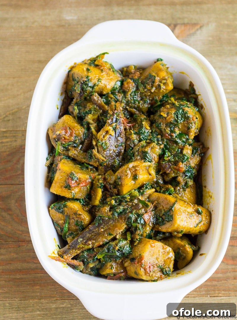 Planting Roots in California 2 Delicious African plantain porridge, a hearty one-pot meal with palm oil and chewy plantain pieces.