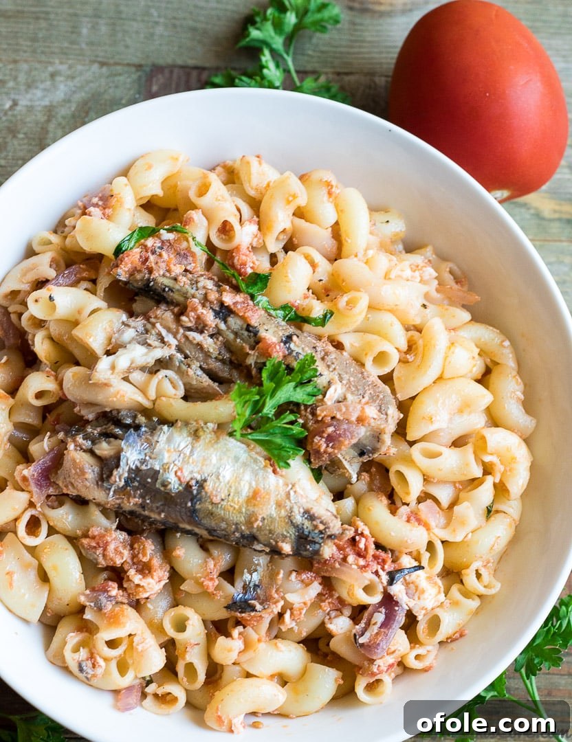 Planting Roots in California 7 Savory African macaroni prepared with sardines in a rich tomato sauce, a quick and delicious one-pot meal.