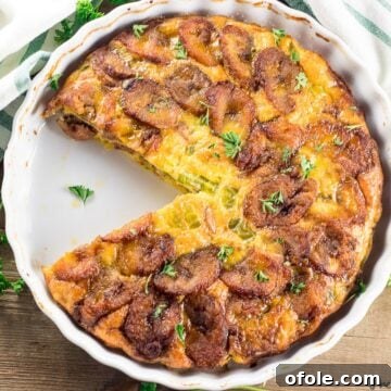 Baked Plantain Frittata - a close-up of a golden frittata with plantains baked into it