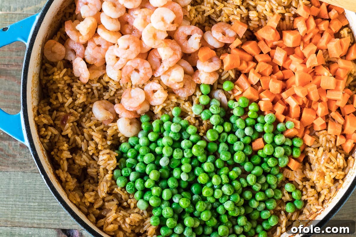 Vibrant Jollof with Succulent Shrimp 2 Flavorful Jollof Rice with Shrimp, a West African comfort food dish