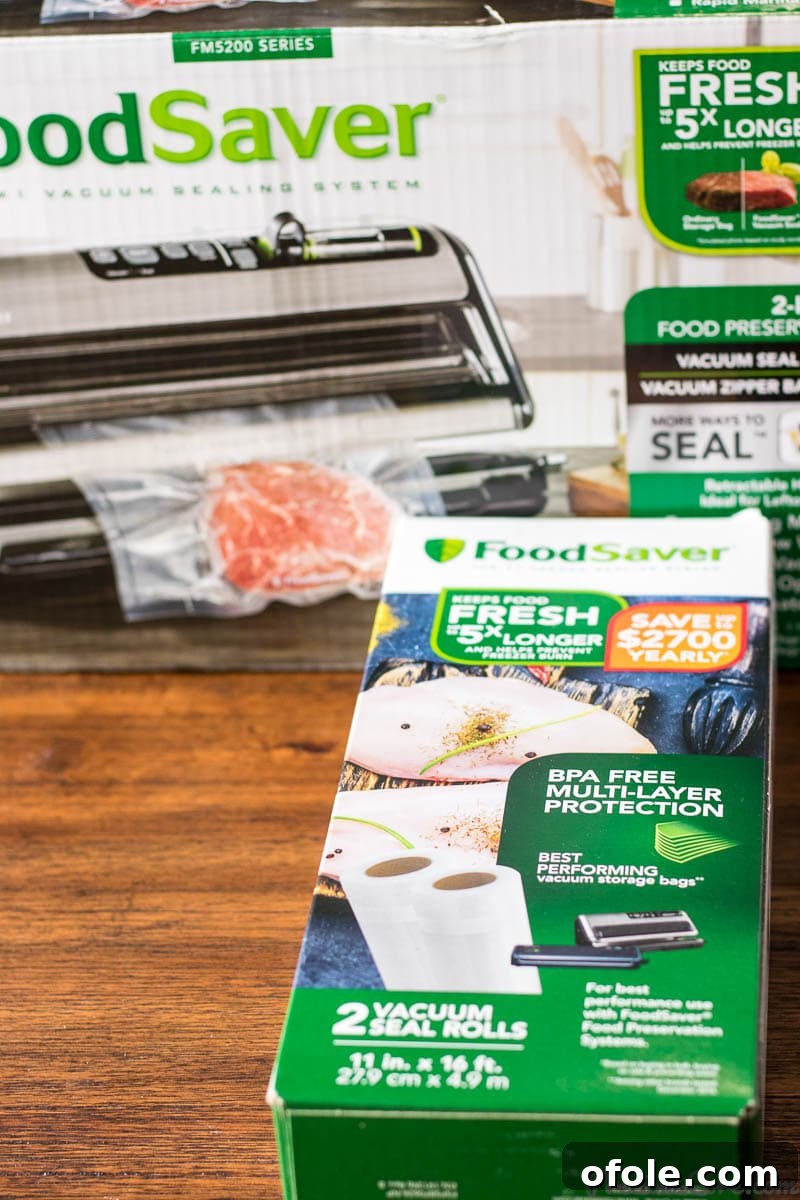One Pan Beef Stir Fry 3 Foodsaver Rolls in front of a Foodsaver box.