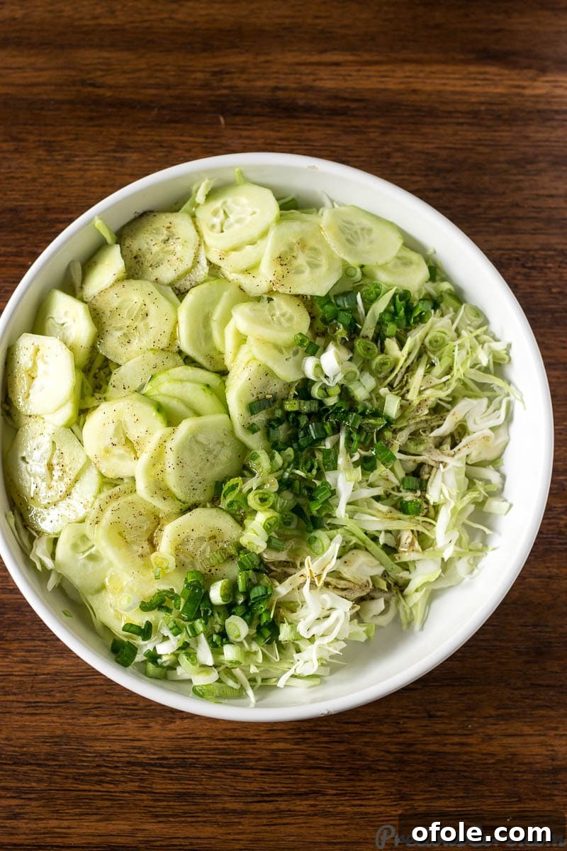 Cabbage Salad in a white bowl, a perfect healthy dish for the new year.