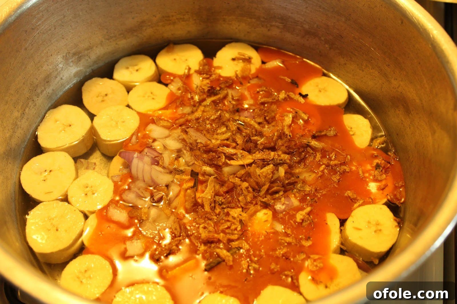 Authentic Sese Plantain Porridge 5 Sese Plantains simmering, showing the rich, emulsified sauce