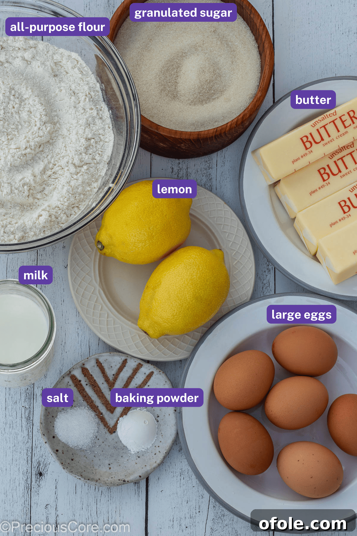Zesty Southern Lemon Pound Cake 6 A flat lay photograph of all the essential ingredients for lemon pound cake, neatly arranged with individual labels.