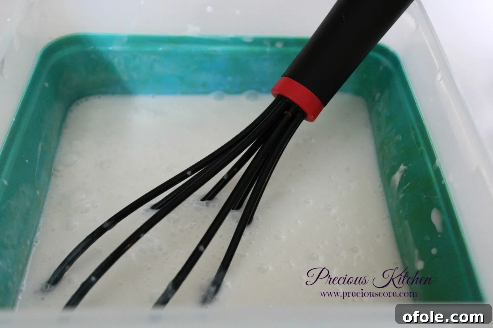 Mixing ingredients for coconut ice cream