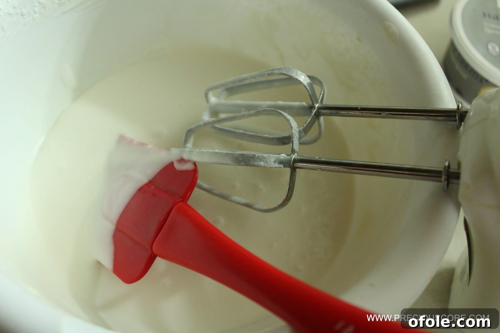 Beating coconut cream for a fruit pizza topping