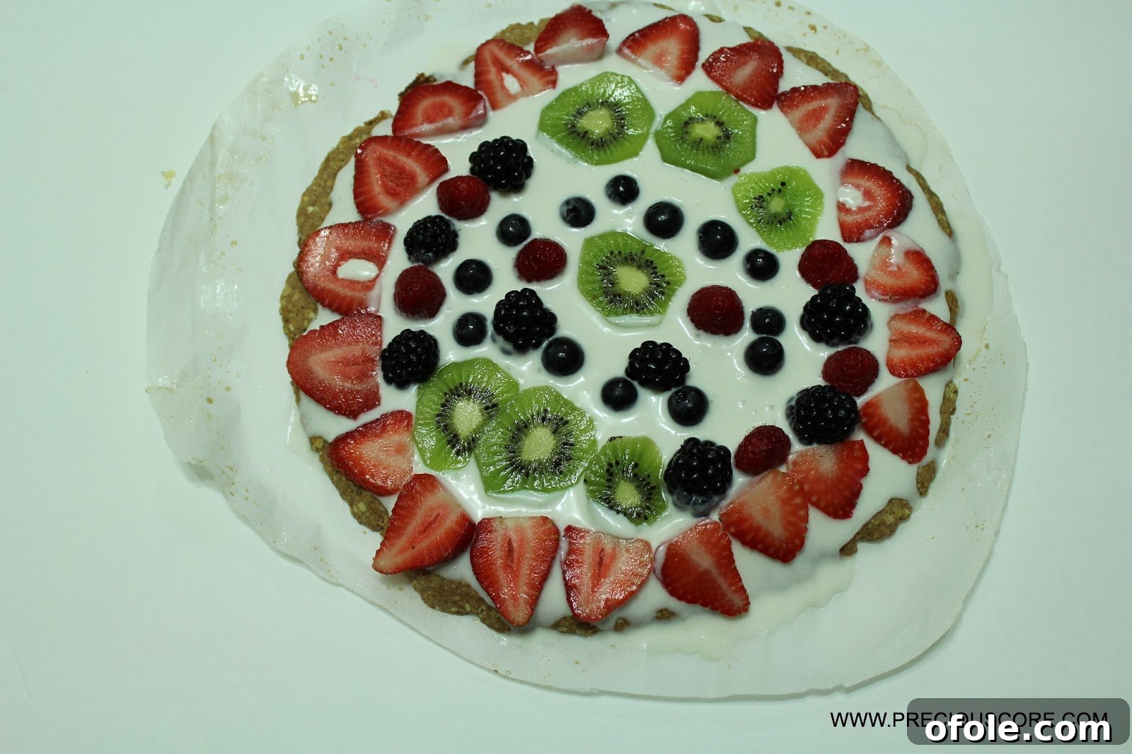 Finished healthy fruit pizza with various fresh fruits
