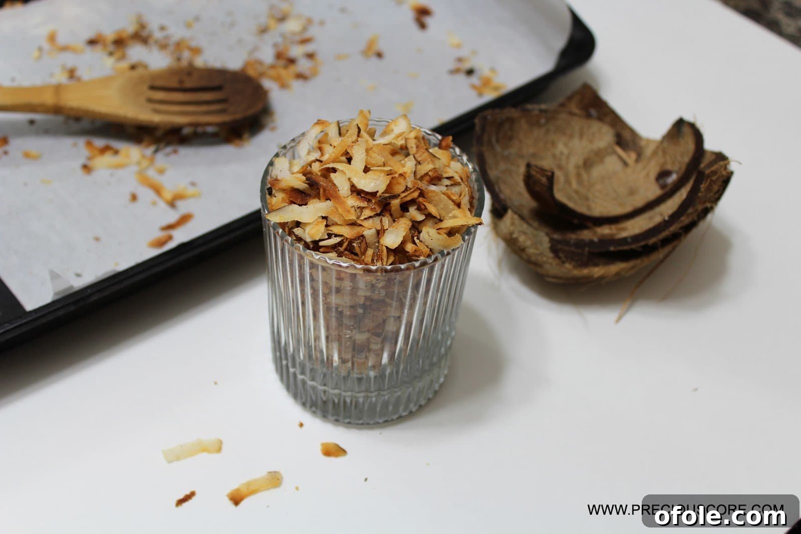 Close-up of toasted coconut sweet being enjoyed