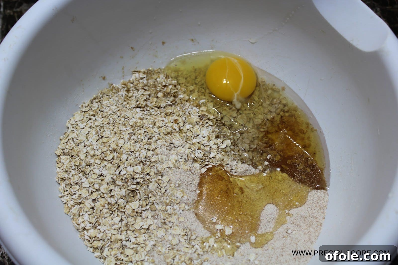Ingredients for healthy fruit pizza crust: whole wheat flour, oats, egg, coconut oil, honey