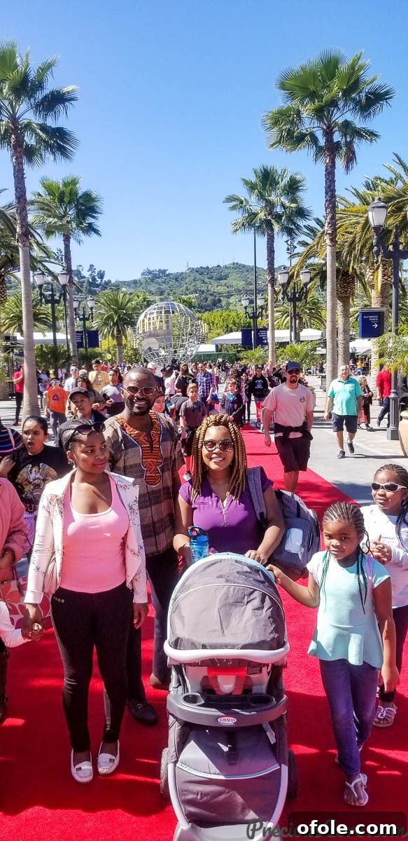 Hollywood Thrills Our Universal Studios Adventure 2 Family walking the red carpet at the entrance of Universal Studios Hollywood