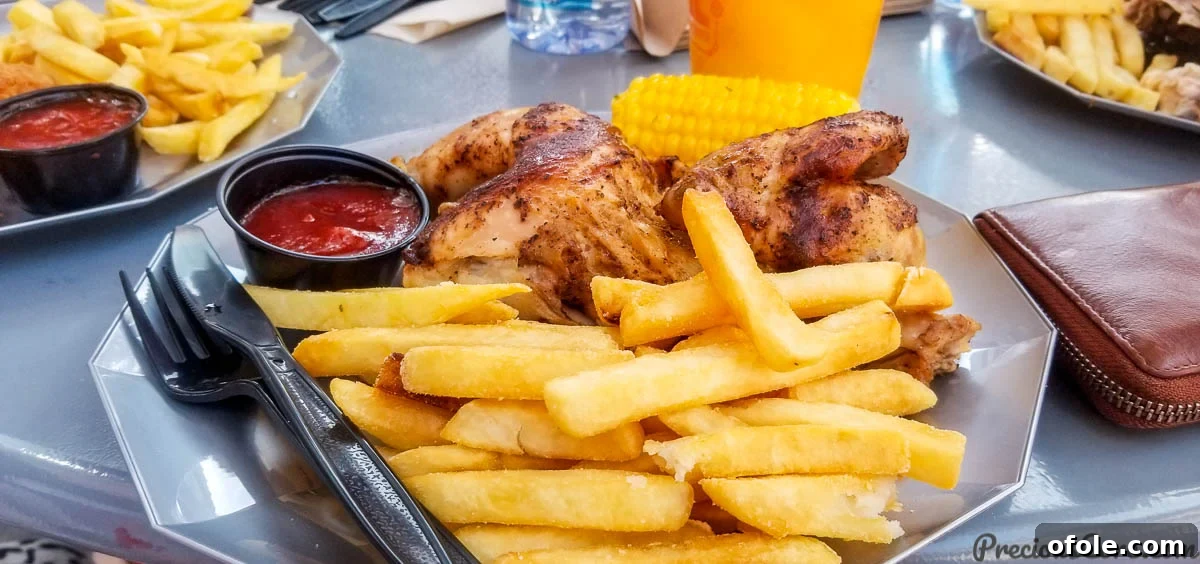 Hollywood Thrills Our Universal Studios Adventure 5 Plate of grilled chicken, fries, and corn at Universal Studios Hollywood