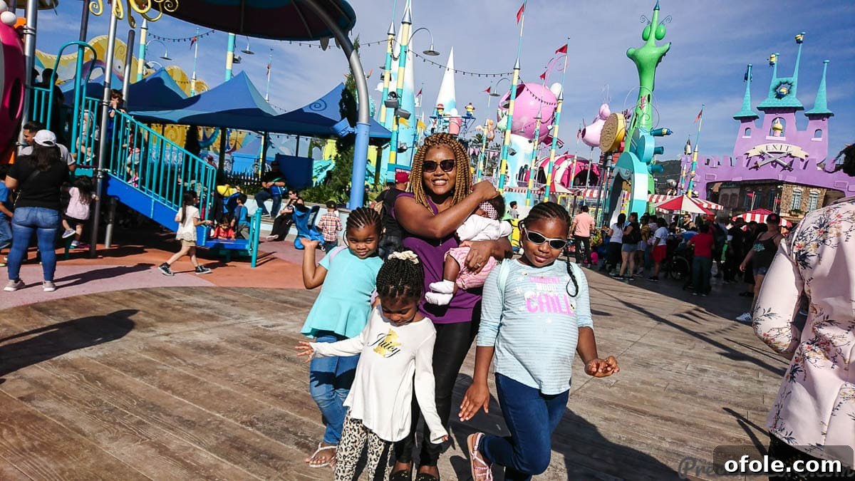 Hollywood Thrills Our Universal Studios Adventure 6 Mother watching her daughters enjoy rides at Super Silly Fun Land in Universal Studios