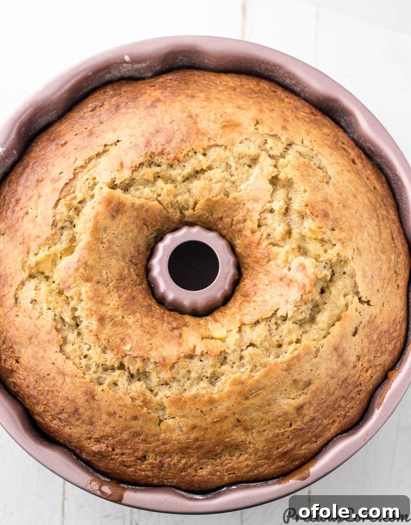 Cake in bundt pan with cracked top