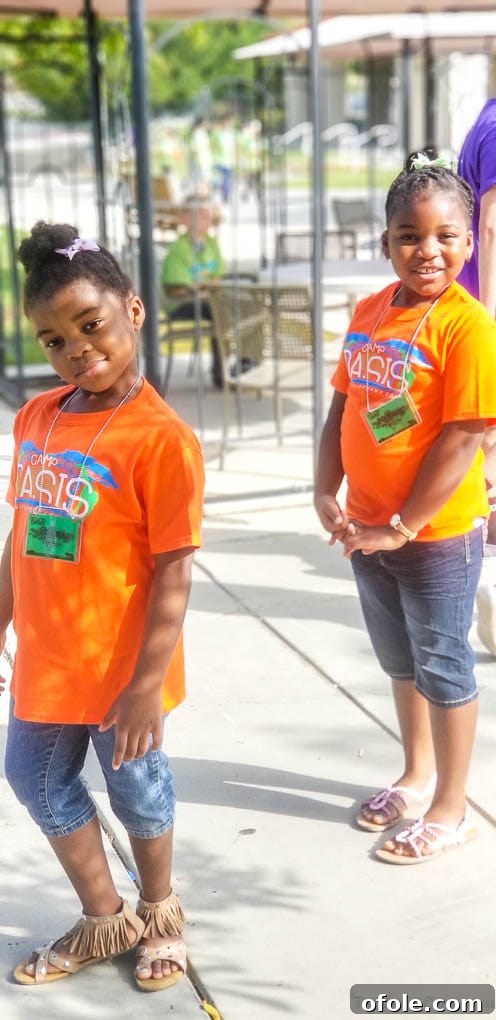 My Latest Chapter 6 Two girls smiling in orange t-shirts.
