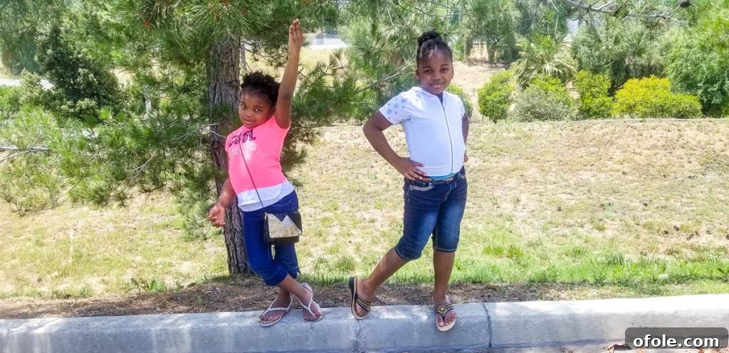 My Latest Chapter 8 Two girls posing on a curb.