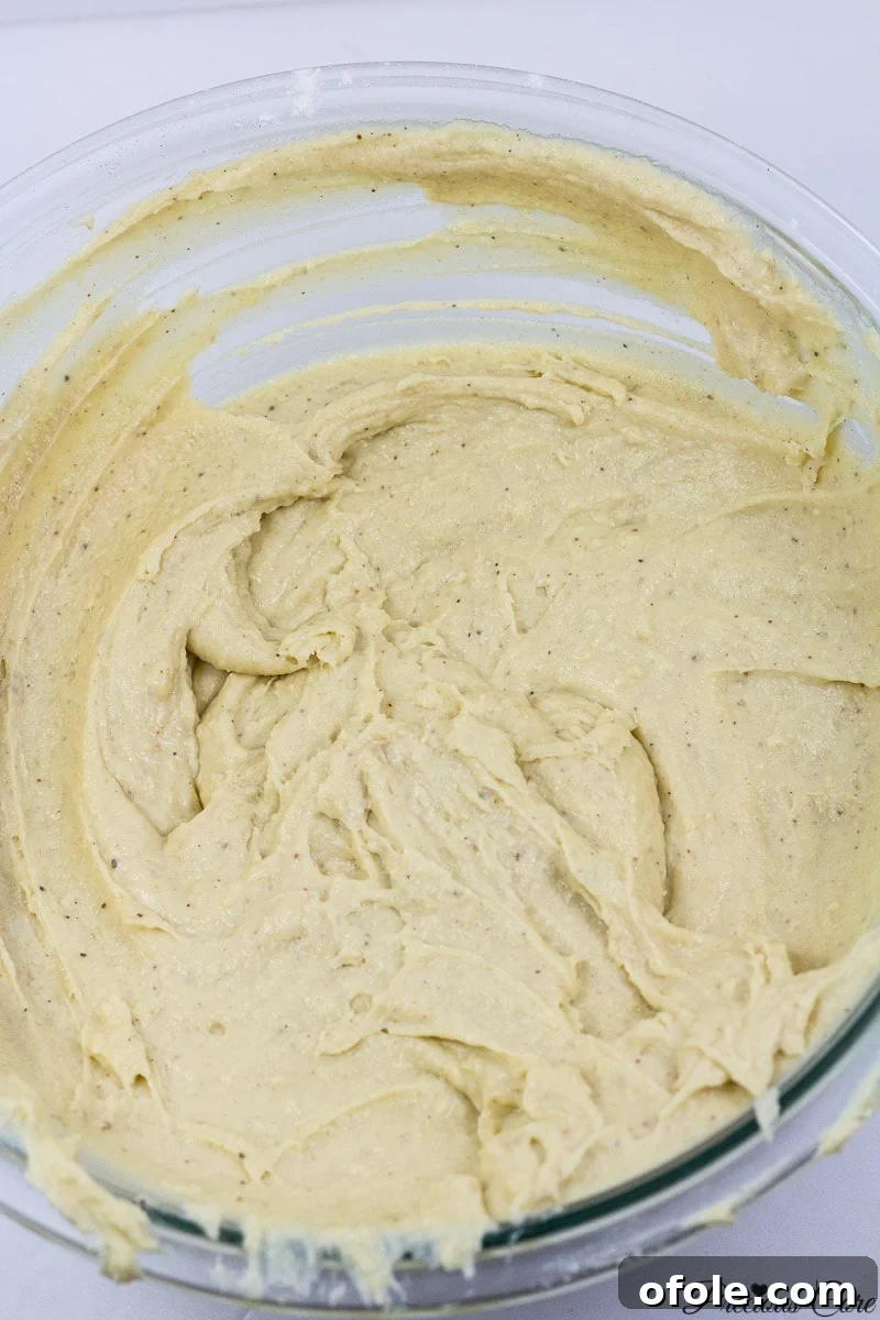 Doughnut batter in a mixing bowl.