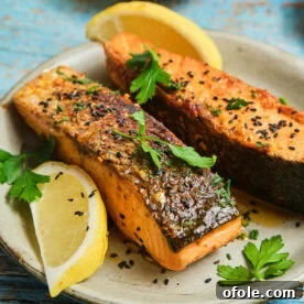 Cajun Honey Butter Salmon on a plate, glazed and perfectly cooked.