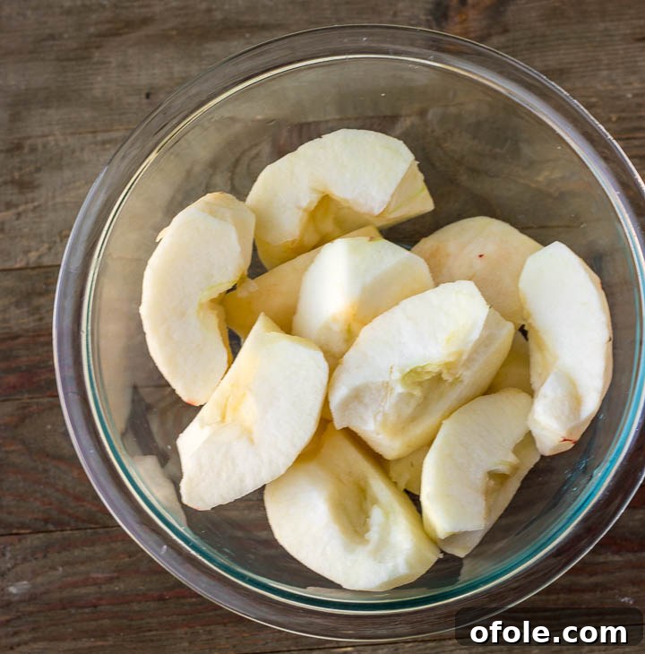 Bowl of peeled apples